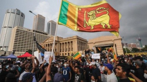 epa09885912 People shout slogans during the day and night protest in front of the Presidential ... epa09885912 People shout slogans during the day and night protest in front of the Presidential ...