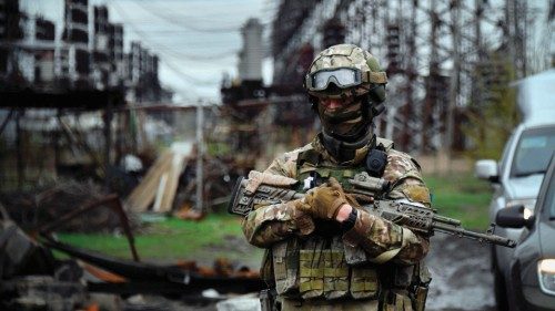 TOPSHOT - In this picture taken on April 13, 2022, a Russian soldier stands guard at the Luhansk ...
