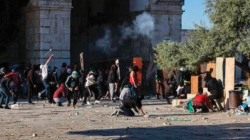 Palestinian demonstrators clash with Israeli police at Jerusalem's Al-Aqsa mosque compound on April ...