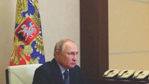 Russia's President Vladimir Putin chairs a meeting on the country's economy via a video link at a ...