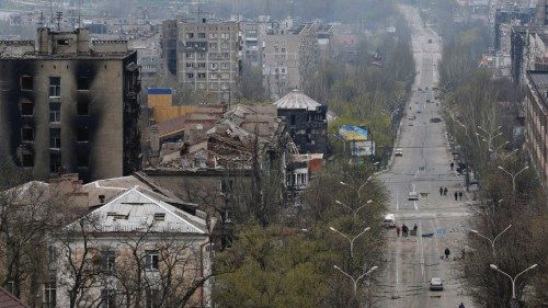 FILE PHOTO: A view shows damaged buildings, with the Azovstal Iron and Steel Works plant in the ...