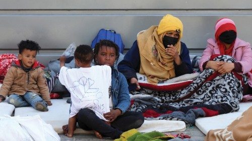 epa09897432 African migrants gather outside the UNHCR headquarters in Tunis, Tunisia, 19 April 2022. ...