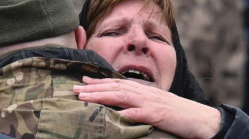 TOPSHOT - Mother of Volodymyr Karas, a Ukrainian serviceman who died during the fighting with ...