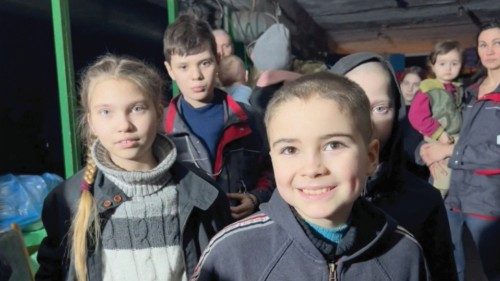 Children react as they take shelter, amid Russia's invasion of Ukraine, in a bunker said by ...