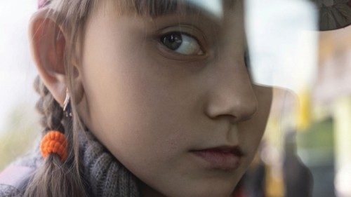 A Ukrainian girl sits on a bus while being evacuated from the frontline city of Lyman, amid Russia's ... A Ukrainian girl sits on a bus while being evacuated from the frontline city of Lyman, amid Russia's ...