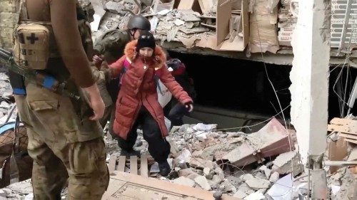 A child emerges from the Azovstal steel plant during UN-led evacuations, after nearly two months of ...