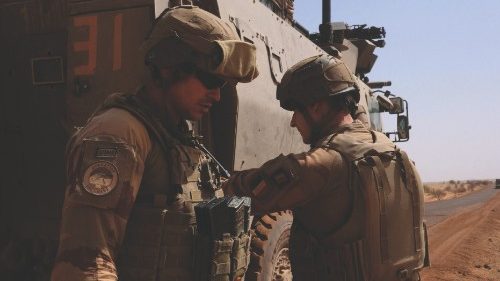 French soldiers from Operation Barkhane escort the last convoy leaving Gossi, Mali, April 17, 2022. ...