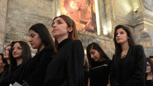 Christian worshippers attend mass at the Syriac Catholic Church of Mar Tuma (Saint Thomas) in Iraq's ...