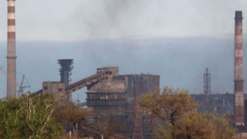 Smoke rises above a plant of Azovstal Iron and Steel Works during Ukraine-Russia conflict in the ...