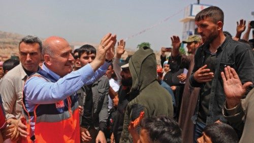 Turkish Minister of Interior Süleyman Soylu greets people as he arrives with a delegation to ...