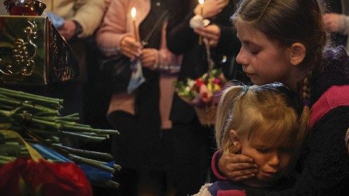 Daughters Anna and Sofiia of Ukrainian serviceman Ruslan Borovyk, who was killed in a battle amid ...