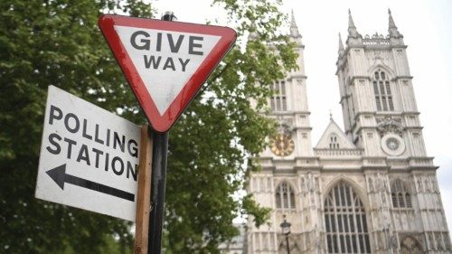 epa09926315 A sign for a polling station in Westminster in London, Britain, 04 May 2022. Local ...