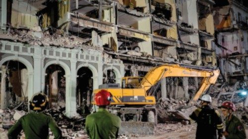 Firefighters and rescue workers remove debris from the ruins of the Saratoga Hotel, in Havana, on ... Firefighters and rescue workers remove debris from the ruins of the Saratoga Hotel, in Havana, on ...