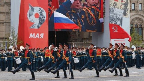 Russian service members take part in a military parade on Victory Day, which marks the 77th ...