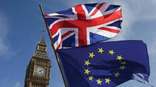 (FILES) In this file photo taken on March 25, 2017 An EU flag and a Union flag held by a ...