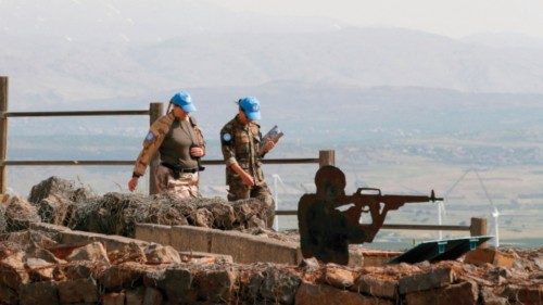 A picture taken in the Israeli-occupied Golan Heights on May 14, 2022, shows members of the United ...