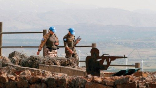 A picture taken in the Israeli-occupied Golan Heights on May 14, 2022, shows members of the United ... A picture taken in the Israeli-occupied Golan Heights on May 14, 2022, shows members of the United ...