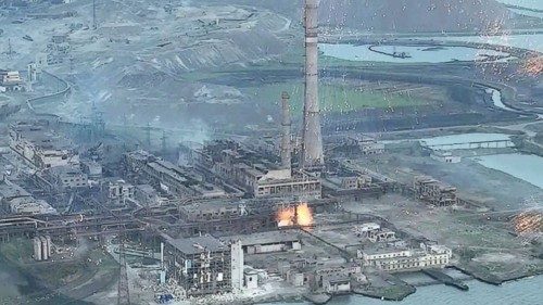 A view of a plant of Azovstal Iron and Steel Works damaged during showers of brightly-burning ...