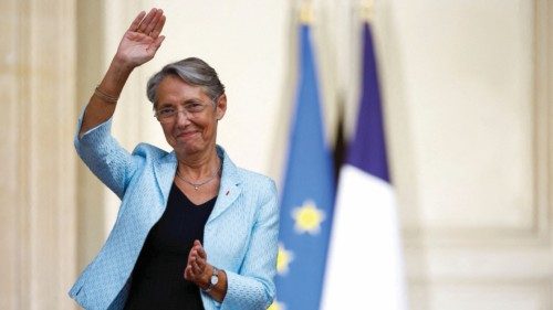 Newly-appointed French Prime Minister Elisabeth Borne gestures as she attends a handover ceremony in ...