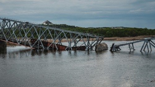 This photograph taken on April 29, 2022 shows a destroyed railway bridge, over the Siverskyi Donets ...