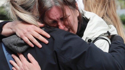 The mother (R) of a Ukrainian soldier deployed to the Russian-sieged Ukrainian city of Mariupol ...