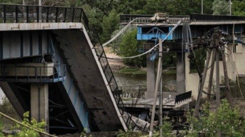 A picture taken on May 22, 2022, shows the destroyed bridge connecting the city of Lysychansk with ...