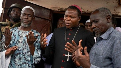 TheArchbishop Dieudonne? Nzapalainga  and Imam Omour Kobine of Bangui pray together during a tour to ...