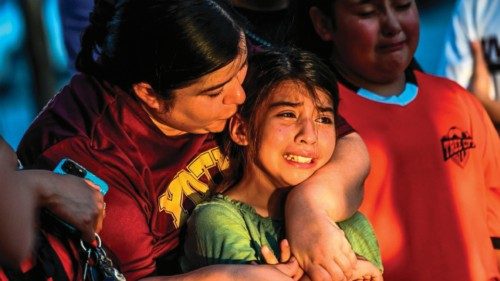 TOPSHOT - Gabriella Uriegas, a soccer teammate of Tess Mata who died in the shooting, cries while ...