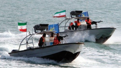 (FILES) In this file photo taken on July 2, 2012, Iranian Revolutionary Guards drive speedboats ...