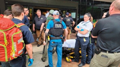 In this handout photo courtesy of Tulsa Police Department taken on June 1, 2022, Police officers and ... In this handout photo courtesy of Tulsa Police Department taken on June 1, 2022, Police officers and ...