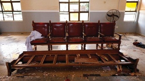 Broken furniture is seen on the ground, following an attack by gunmen on worshippers during a Sunday ...