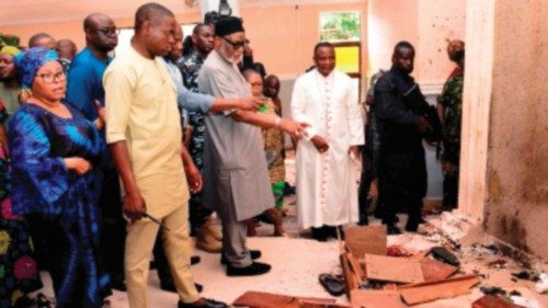 EDITORS NOTE: Graphic content / Ondo State governor Rotimi Akeredolu (3rd L) points to blood the ...