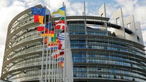 epa10001359 A Ukrainian flag is hoisted along European Union countries' flags outside the European ...