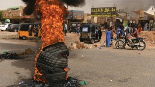 epa09994292 A barricade on fire during a rally marking the third anniversary of a crackdown on mass ...