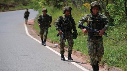 Soldiers patrol a road in Yolombo, Suarez, Cauca department, Colombia, on May 29, 2022, on election ...