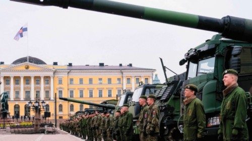 Military personnel and vehicles are lined up during a national parade at Senate Square ...