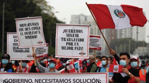 epa09992667 Hundreds of workers in the mining sector protest to demand that the Peruvian government ...