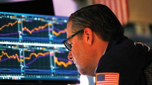 NEW YORK, NEW YORK - JUNE 08: Traders work on the floor of the New York Stock Exchange during ...