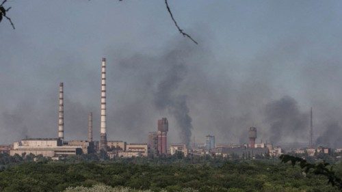 FILE PHOTO: Smoke rises after a military strike on a compound of Sievierodonetsk's Azot Chemical ... FILE PHOTO: Smoke rises after a military strike on a compound of Sievierodonetsk's Azot Chemical ...