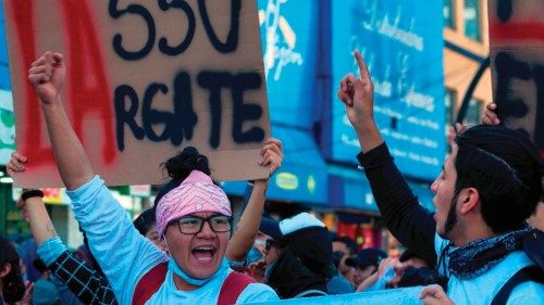 TOPSHOT - University students march during a demonstration against the government of President ...