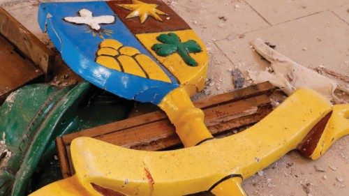 Broken pieces of furniture are seen on the ground, following an attack by gunmen on worshippers ...