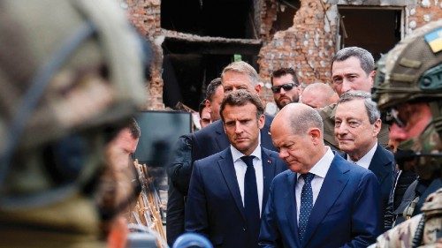 TOPSHOT - (From L) French President Emmanuel Macron, German Chancellor Olaf Scholz and Italian Prime ...