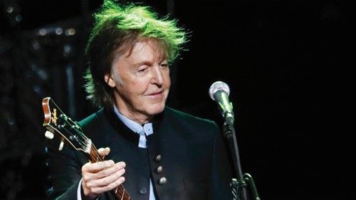 (FILES) In this file photo taken on July 27, 2017 British musician Paul McCartney performs during a ...