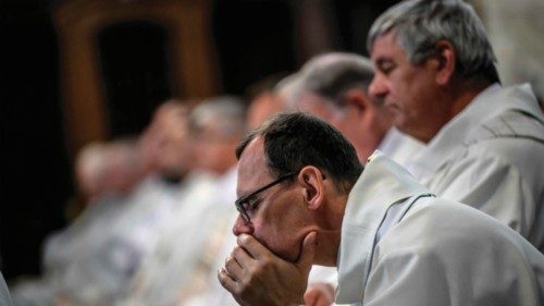 Bishops take part in a mass during the extraordinary plenary assembly of the Bishops of France in ...