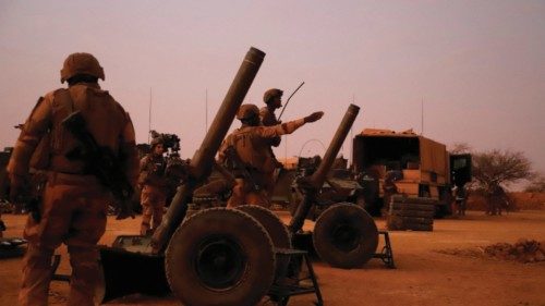 FILE PHOTO: French soldiers from Operation Barkhane, prepare to fire mortars with flare shells on a ...