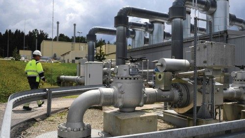 A worker checks a unit at Uniper's Bierwang gas storage facility near the Bavarian town of Kraiburg ...