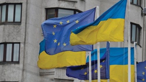 Flags of Ukraine and European Union wave at European Square in Kyiv on June 24, 2022, amid Russian ...