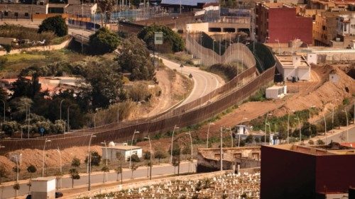 (FILES) This file photo taken on March 4, 2022 shows a view of the border fence separating Morocco ...
