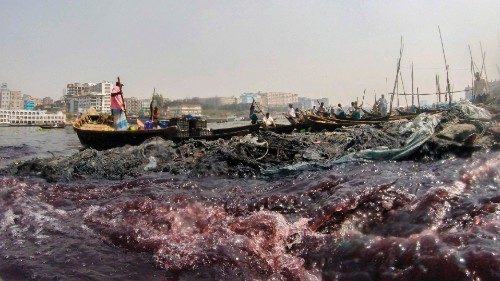 TOPSHOT - In this picture taken on March 13, 2022, industrial effluents enter the Buriganga River as ... TOPSHOT - In this picture taken on March 13, 2022, industrial effluents enter the Buriganga River as ...