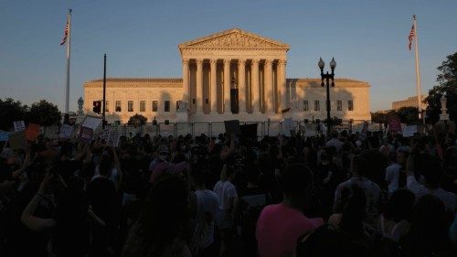 WASHINGTON, DC - JUNE 24: The sun sets on the U.S. Supreme Building as protests occur in reaction to ...